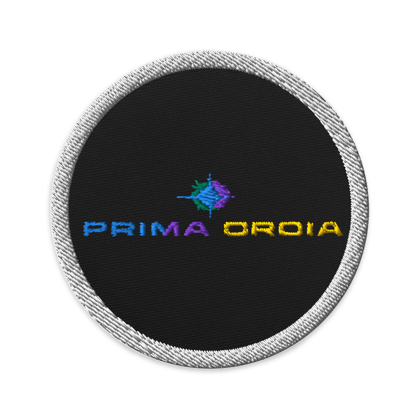 Black PRIMA ORDIA embroidered patch on a white background